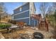 Stone patio with seating area and fire pit at 107 Watson Se Cir, Atlanta, GA 30317