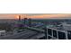 Panoramic sunset view of cityscape and highway at 1280 W Peachtree Nw St # 3902, Atlanta, GA 30309