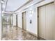 Elegant hallway with marble floors and modern lighting at 1280 W Peachtree Nw St # 3902, Atlanta, GA 30309