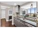 Modern kitchen with stainless steel appliances and granite countertops at 1280 W Peachtree Nw St # 3902, Atlanta, GA 30309