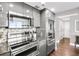 Modern kitchen with stainless steel appliances and granite countertops at 1280 W Peachtree Nw St # 3902, Atlanta, GA 30309