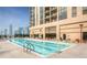 Refreshing rooftop pool with plenty of lounge chairs at 1280 W Peachtree Nw St # 3902, Atlanta, GA 30309