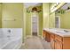 Bathroom boasts double vanity and garden tub at 1943 Ivy Branch Ct, Loganville, GA 30052