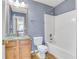 Clean bathroom, granite countertop, and bathtub at 1943 Ivy Branch Ct, Loganville, GA 30052