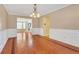 Spacious dining room, hardwood floors, view into Gathering room at 1943 Ivy Branch Ct, Loganville, GA 30052