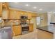 Modern kitchen with stainless steel appliances and granite counters at 1943 Ivy Branch Ct, Loganville, GA 30052