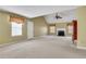 Living room with vaulted ceiling and fireplace at 1943 Ivy Branch Ct, Loganville, GA 30052