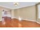 Sunlit living room with hardwood floors and bay window at 1943 Ivy Branch Ct, Loganville, GA 30052