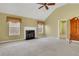 Bright living room with fireplace and high ceiling at 1943 Ivy Branch Ct, Loganville, GA 30052