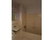 View of a vintage bathroom with beige tile and a bathtub at 3265 Heard Drive, Cumming, GA 30040