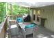 Spacious deck with seating area, grill, and shade awning at 34 Timber Chase Dr, Dallas, GA 30157