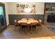 Dining room with mid-century modern table and chairs, and gallery wall at 34 Timber Chase Dr, Dallas, GA 30157