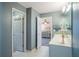 Bathroom with grey walls offering a seamless view into a bedroom at 753 Win West Xing, Auburn, GA 30011