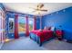 Charming bedroom with a blue star wall and red accents at 753 Win West Xing, Auburn, GA 30011