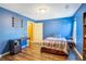 Basement bedroom with wood floors and plenty of natural light at 753 Win West Xing, Auburn, GA 30011