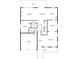 Detailed first floor plan showing layout of living room, kitchen, bedrooms, and garage at 753 Win West Xing, Auburn, GA 30011