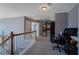 Upstairs hallway with a home office and storage at 753 Win West Xing, Auburn, GA 30011