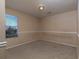 Simple bedroom with carpet and window at 826 Shore Drive, Lithonia, GA 30058