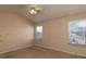 Main bedroom with two windows and ceiling fan at 826 Shore Drive, Lithonia, GA 30058