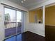 Dining area with dark hardwood floors and access to deck at 826 Shore Drive, Lithonia, GA 30058