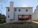 Two-story house with deck and backyard at 826 Shore Drive, Lithonia, GA 30058