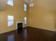 Spacious living room with high ceilings, hardwood floors, and fireplace at 826 Shore Drive, Lithonia, GA 30058