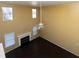 Living room with high ceilings, fireplace, and hardwood floors at 826 Shore Drive, Lithonia, GA 30058