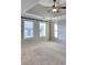 Well-lit bedroom with ceiling fan and carpeted floors at 2714 Legislative Ln, Buford, GA 30519