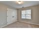 Bedroom with double doors and window at 2714 Legislative Ln, Buford, GA 30519