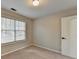 Bedroom with window and door at 2714 Legislative Ln, Buford, GA 30519