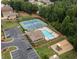 Aerial view of community pool, tennis courts, and playground at 2714 Legislative Ln, Buford, GA 30519