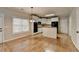 Bright dining area with hardwood floors and kitchen views at 2714 Legislative Ln, Buford, GA 30519