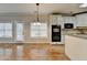 Bright dining area with hardwood floors and kitchen views at 2714 Legislative Ln, Buford, GA 30519