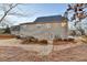 House exterior showcasing a side view and landscaping at 2714 Legislative Ln, Buford, GA 30519