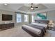 Main bedroom with large bed, TV, and plenty of space at 2714 Legislative Ln, Buford, GA 30519