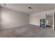 Generous bedroom with plush carpeting and an entry way at 7369 Saint Peter Way, Fairburn, GA 30213