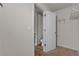 Walk-in closet with hardwood flooring and wire shelving at 7369 Saint Peter Way, Fairburn, GA 30213