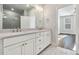 Elegant bathroom with double vanity, quartz countertop and a large walk-in shower at 860 Constellation Dr, Decatur, GA 30033