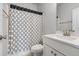 Clean bathroom with shower/tub combo and updated vanity at 860 Constellation Dr, Decatur, GA 30033