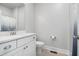 Simple bathroom with white vanity and shower at 860 Constellation Dr, Decatur, GA 30033