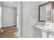 Small powder room with pedestal sink and simple design at 860 Constellation Dr, Decatur, GA 30033