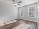 Spacious bedroom with hardwood floors and two windows at 860 Constellation Dr, Decatur, GA 30033