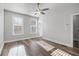 Bright bedroom with hardwood floors and ceiling fan at 860 Constellation Dr, Decatur, GA 30033