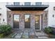 Townhouse entry with brick facade and stone walkway at 860 Constellation Dr, Decatur, GA 30033