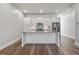 Kitchen island with granite countertop and white cabinets at 860 Constellation Dr, Decatur, GA 30033