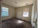 Bright bedroom featuring two windows and carpet flooring at 1357 Sharon St, Atlanta, GA 30314