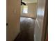 Carpeted bedroom with ceiling fan and window at 1357 Sharon St, Atlanta, GA 30314