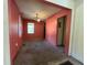 Simple dining area with pink walls and carpet at 1357 Sharon St, Atlanta, GA 30314
