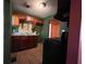 Kitchen with dark wood cabinets and tiled floor at 1357 Sharon St, Atlanta, GA 30314