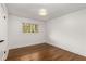 Spacious bedroom with hardwood floors and large windows at 3011 Silvapine Ne Trl, Atlanta, GA 30345